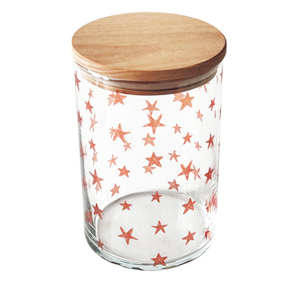 Transparentes Bonbonglas mit roten Sternen